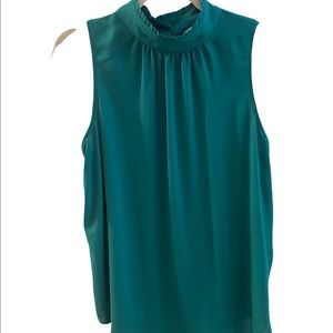 Never worn Loft top. Beautiful color and fit.